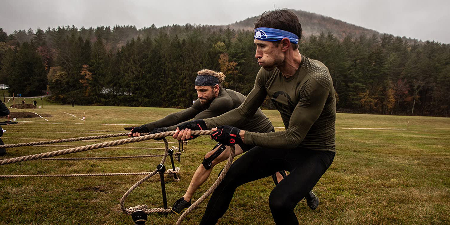 Spartan Racers tugging thick rope